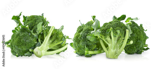 Fresh raw broccoli on white plate, close up