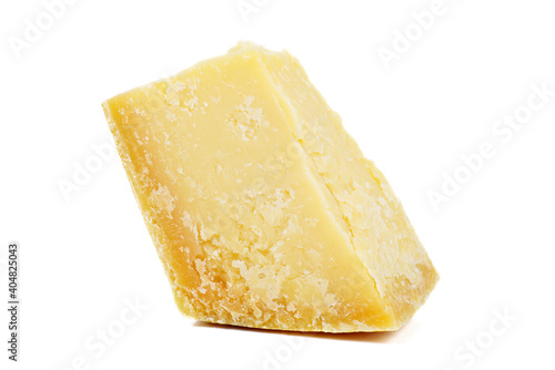 Piece of parmesan cheese isolated on white background.