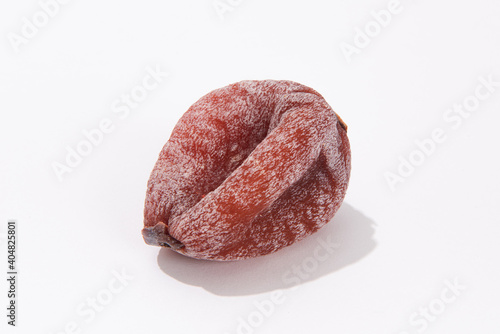 dried persimmon on white background