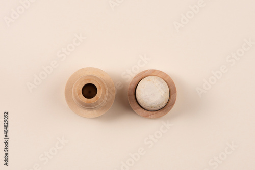 Two different bottle stoppers. One is natural, the other is plastic. Top view. The concept of alternative. photo