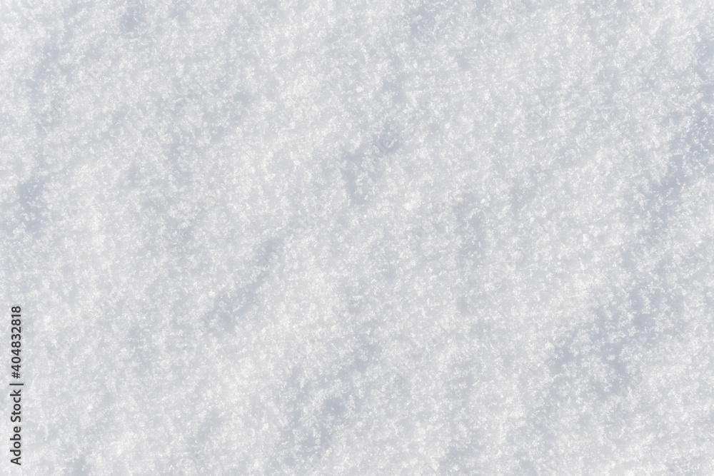 Fototapeta premium White clean shiny snow background texture. fresh snow seamless texture. snowy surface closeup