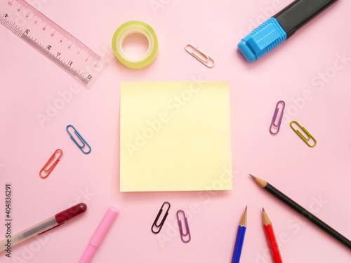 School office supplies on a desk with copy space. Back to school concept.