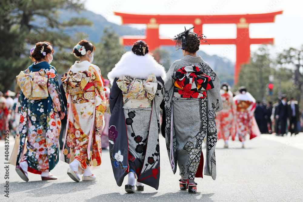 Japanese young girls wearing mask in Kimono (furisode)
