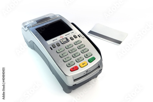 credit card reader pos machine and a credit card isolated on white background in the retail shopping mall