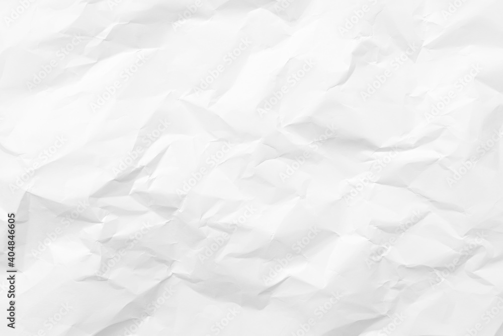 Fototapeta premium White crumpled paper texture background. Clean white paper. Top view.