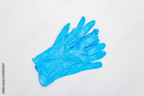 Light blue surgical gloves isolated on white background © FuzullHanum