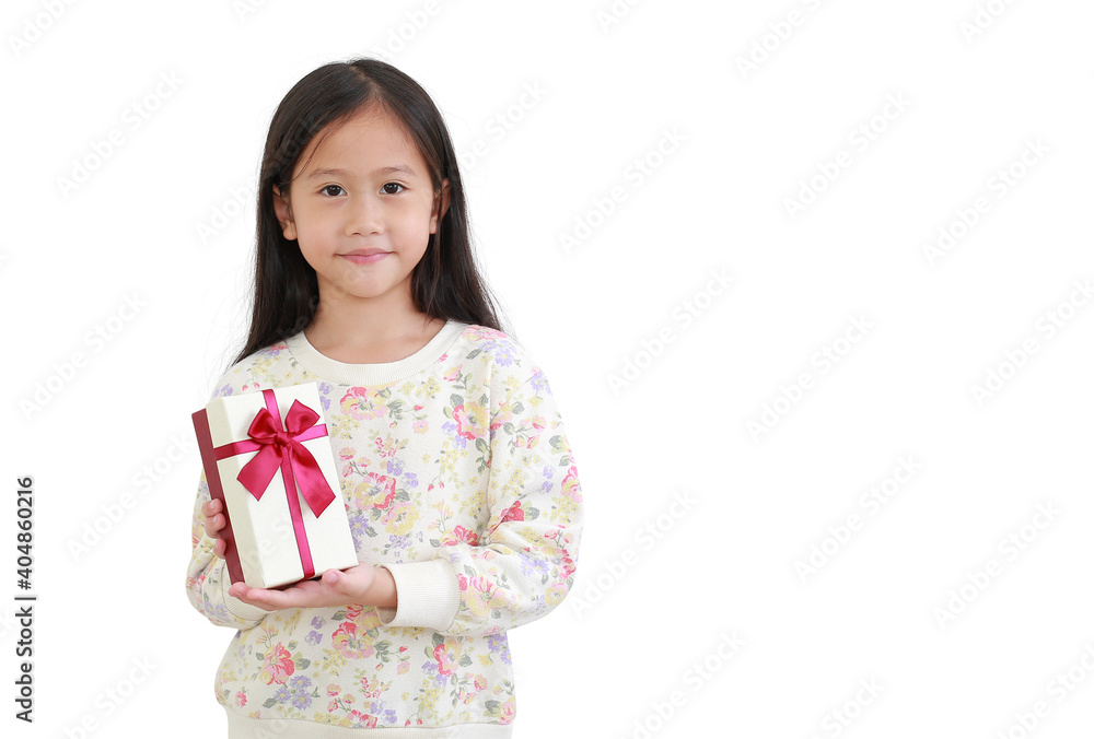 Beautiful asian little kid girl holding gift box on white background with copy space Beautiful asian little kid girl holding gift box on white background with copy space