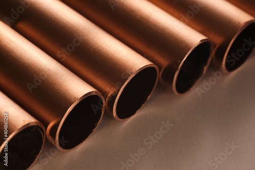Close up of cut copper tubes, commodity concept.