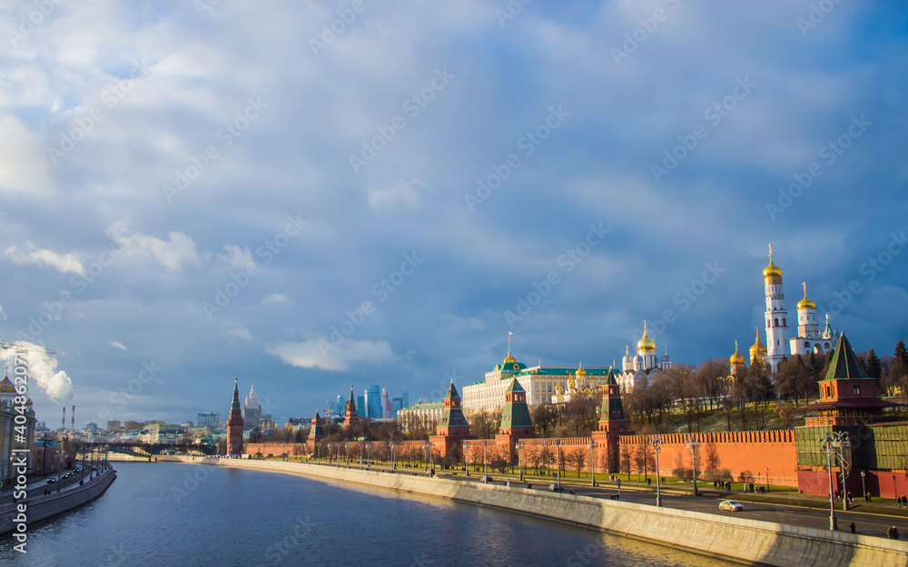 Kremlin and Moskva river embankment in sunlight