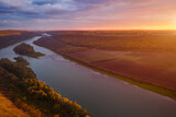 Beautiful top view of winding river in sunset. Scenic image of drone photography.