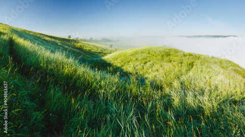 Fantastic day with green hills and cultivated fields. Picturesque summer scene.