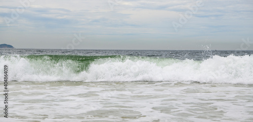 Ocean surf on the beach of Copacabana. Rio de Janeiro, February 2020ю