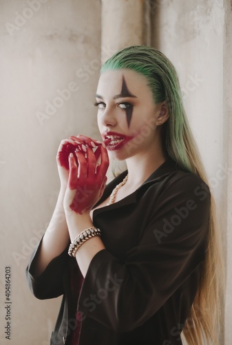 Stock Photo - Bloody Halloween theme: crazy joker face photo