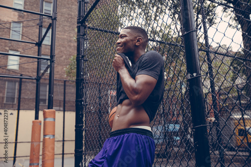 Basketball player training on a court in New york city