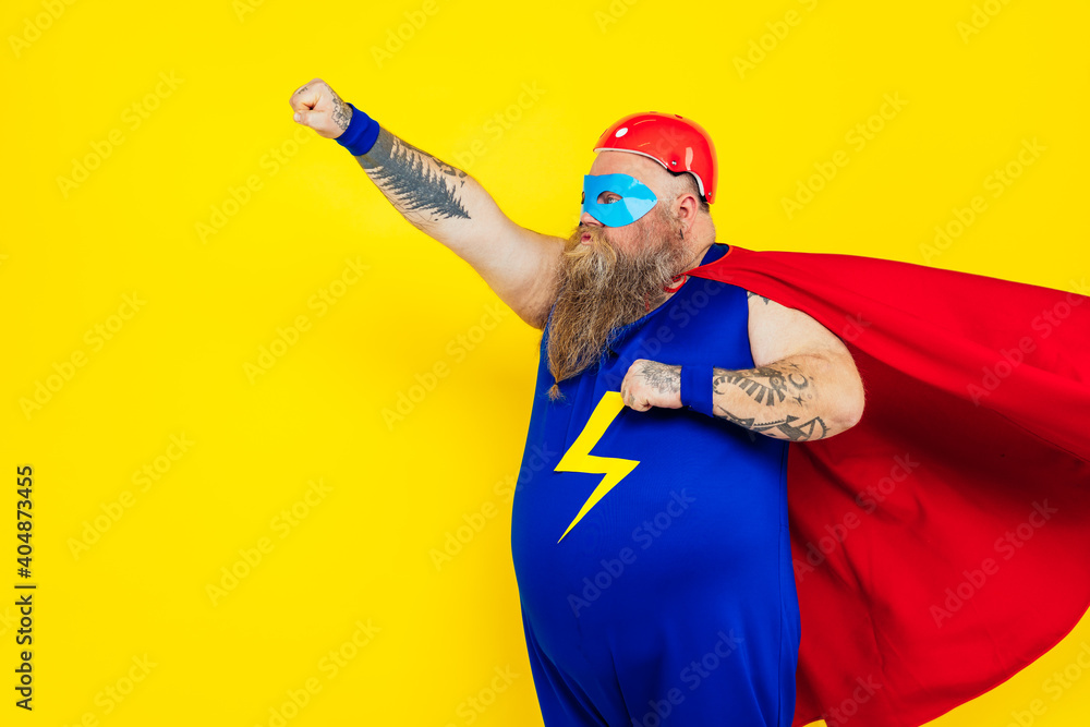 Funny man wearing a superhero costume Stock Photo | Adobe Stock