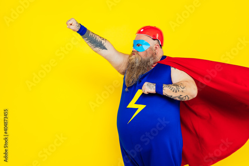 Funny man wearing a superhero costume photo