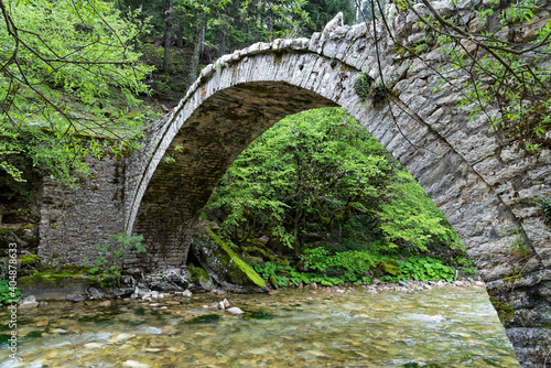 View of the traditional stone Michou Bridge in Thessaly, Greece
