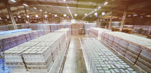 Food industrial warehouse for storage and storage of packagings with drinks   water   beer in plastic PET bottles.