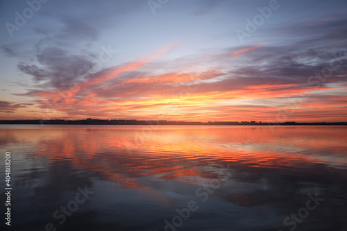 Picturesque view of beautiful sunset over river. Nature healing power