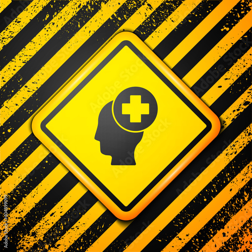 Black Male head with hospital icon isolated on yellow background. Head with mental health, healthcare and medical sign. Warning sign. Vector. photo