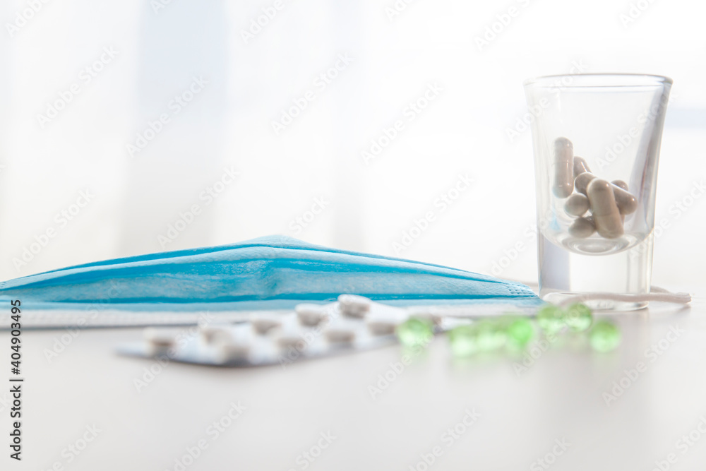 Medicines, vitamins-e, masks Placed on the table Medicines, vitamins-e, masks Placed on the table