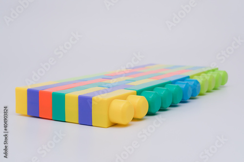 Multi-colour Bricks construction on white background