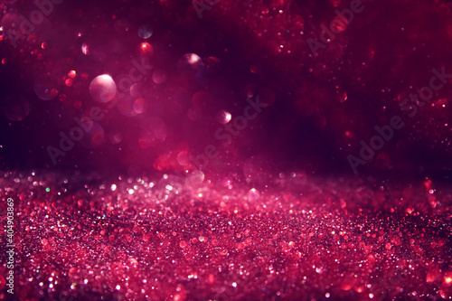 purple  black and pink glitter vintage lights background. defocused