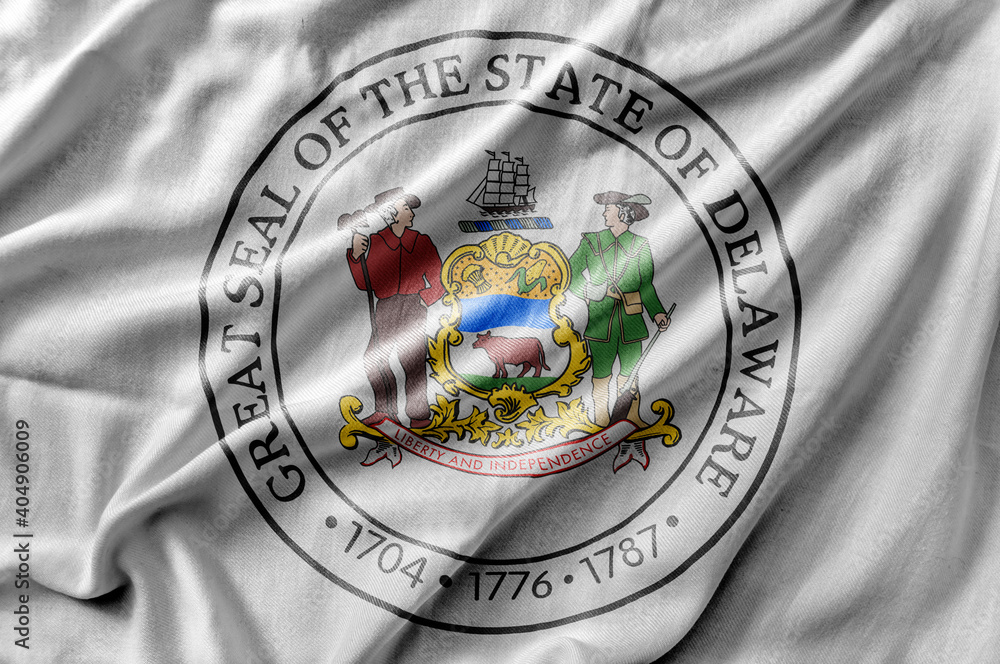 Φωτογραφία Waving detailed national US country state flag of Delaware Seal