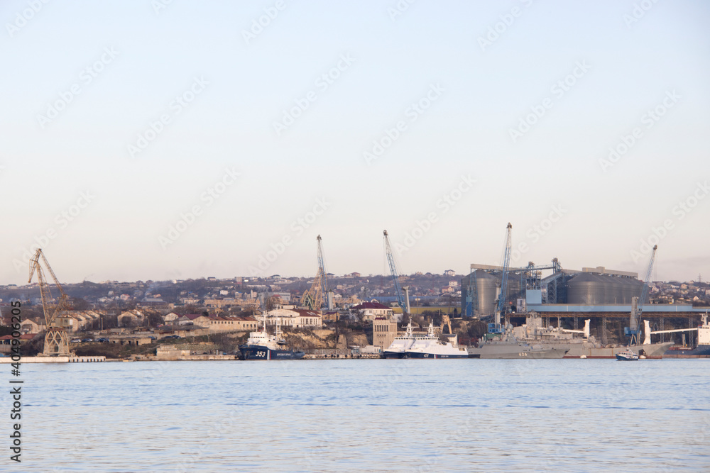 Military and patrol ships moored at berths in Sevastopol Bay, Crimea, Russia