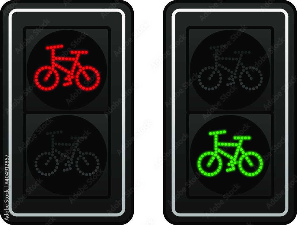 Obraz premium Two sets of LED bicycle lane traffic lights showing red or green lights.