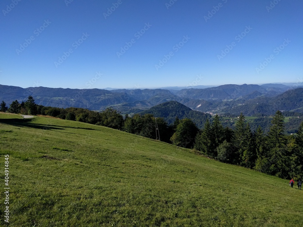 landscape with grass and mountains landscape with grass and mountains