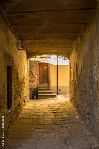 A covered alley in the village of Montemerano near Manciano in Grosseto province, Tuscany, Italy
