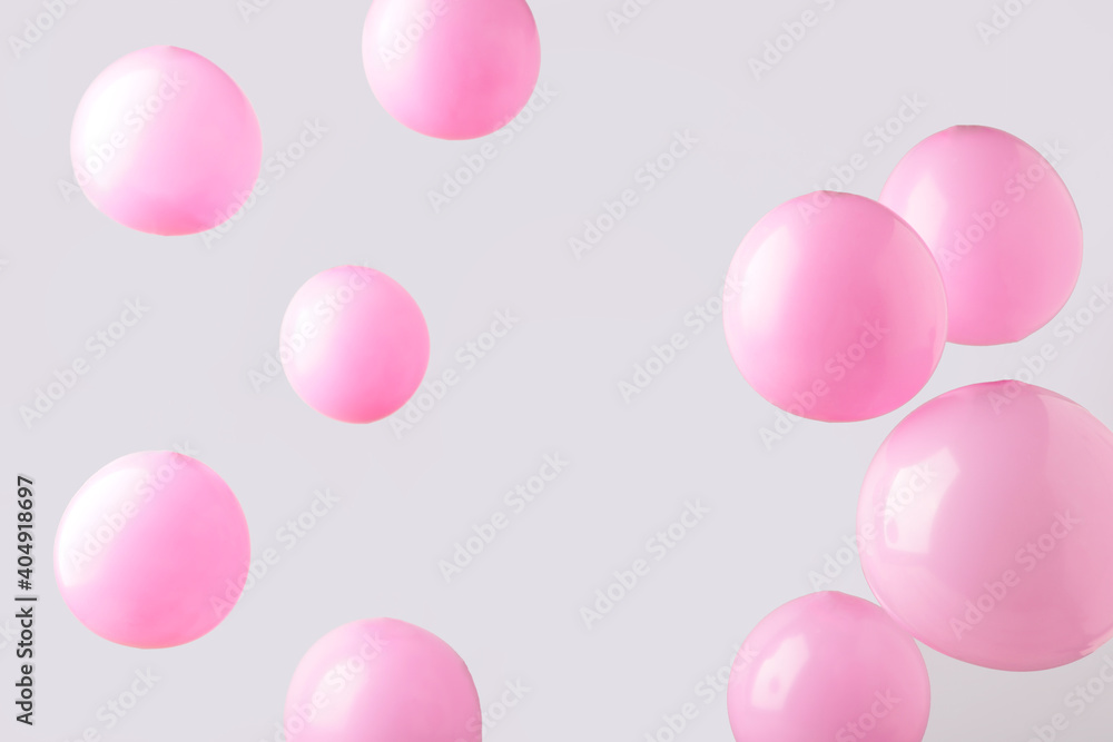 Pink pastel baloons on grey background. Minimalism Pink pastel baloons on grey background. Minimalism