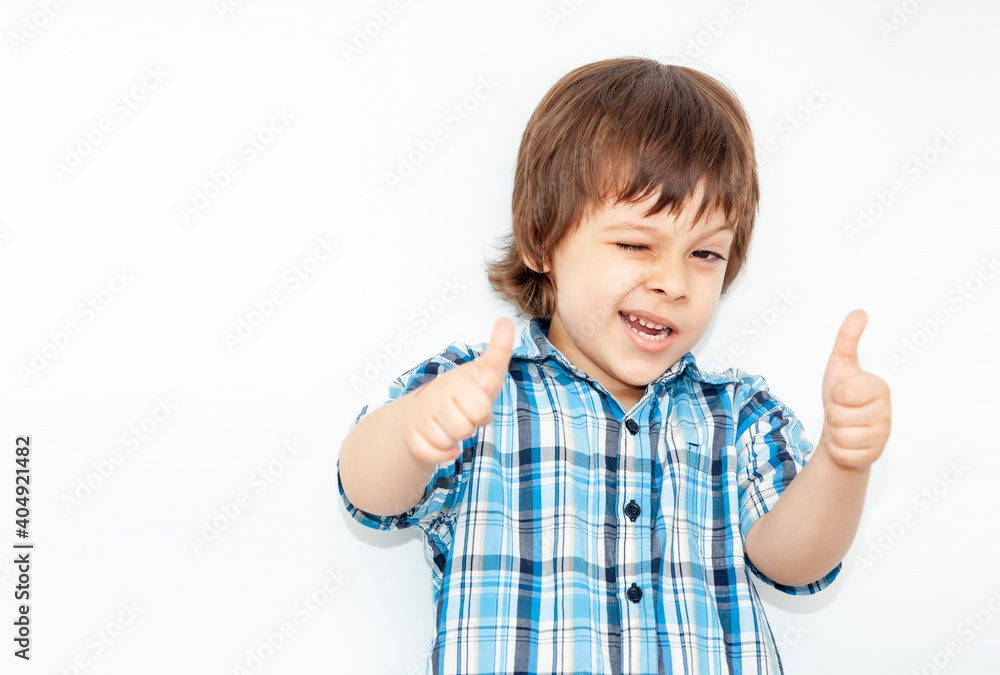 portrait of an emotional boy on a light background portrait of an emotional boy on a light background