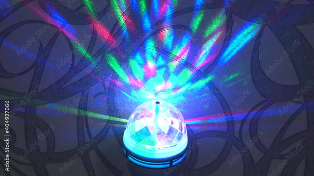 colorful swirling hemisphere is reflected by glare and rays colorful swirling hemisphere is reflected by glare and rays