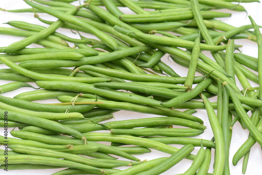 Fresh green string beans isolated on a white background Fresh green string beans isolated on a white background