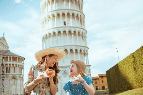 Murais de parede happy young mother and child with pizza