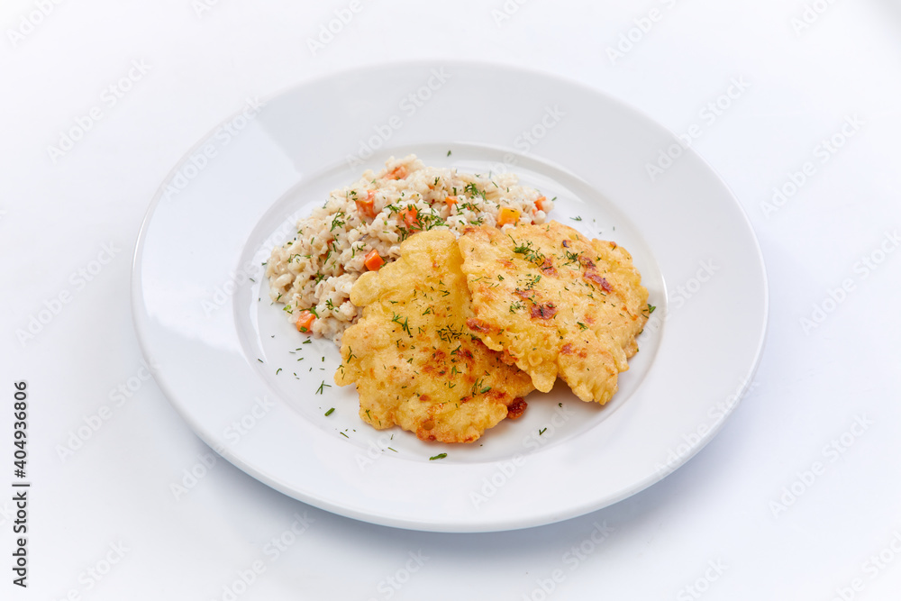 fried chicken breast with barley on the white background fried chicken breast with barley on the white background