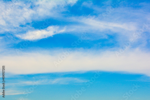 Blue sky with cirrus clouds. Background for design and project.