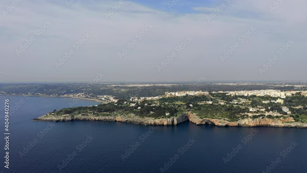 Castro, Italy. Medieval city resting on the rocky shore of the Adriatic. Aerial view of the old town on the hill, and the marina below. High quality 4k footage Castro, Italy. Medieval city resting on the rocky shore of the Adriatic. Aerial view of the old town on the hill, and the marina below. High quality 4k footage