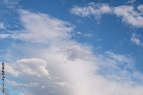Fototapeta Naklejka Na Ścianę i Meble -  abstract background of white fluffy clouds on a bright blue sky