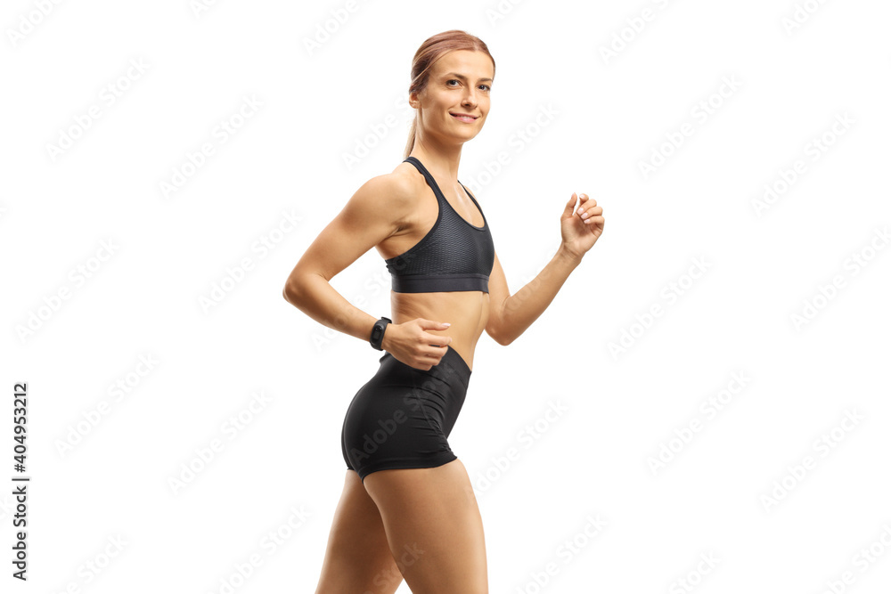 Bodybuilder woman in sportswear looking at the camera Bodybuilder woman in sportswear looking at the camera