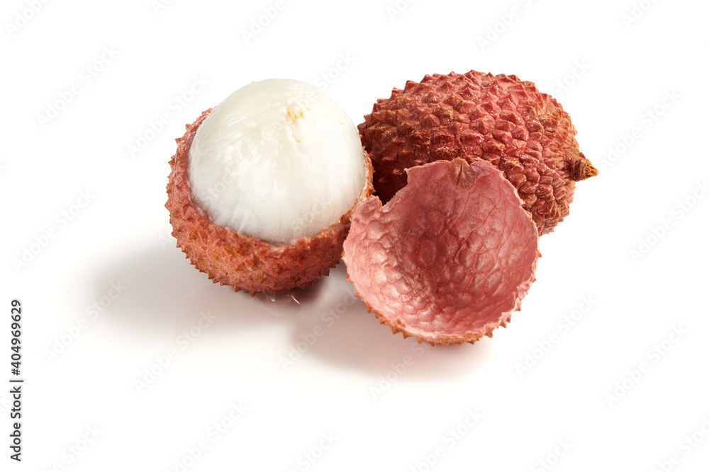 Sweet ripe lychee fruit with fresh pulp isolated on white background. Close up view. Sweet ripe lychee fruit with fresh pulp isolated on white background. Close up view.