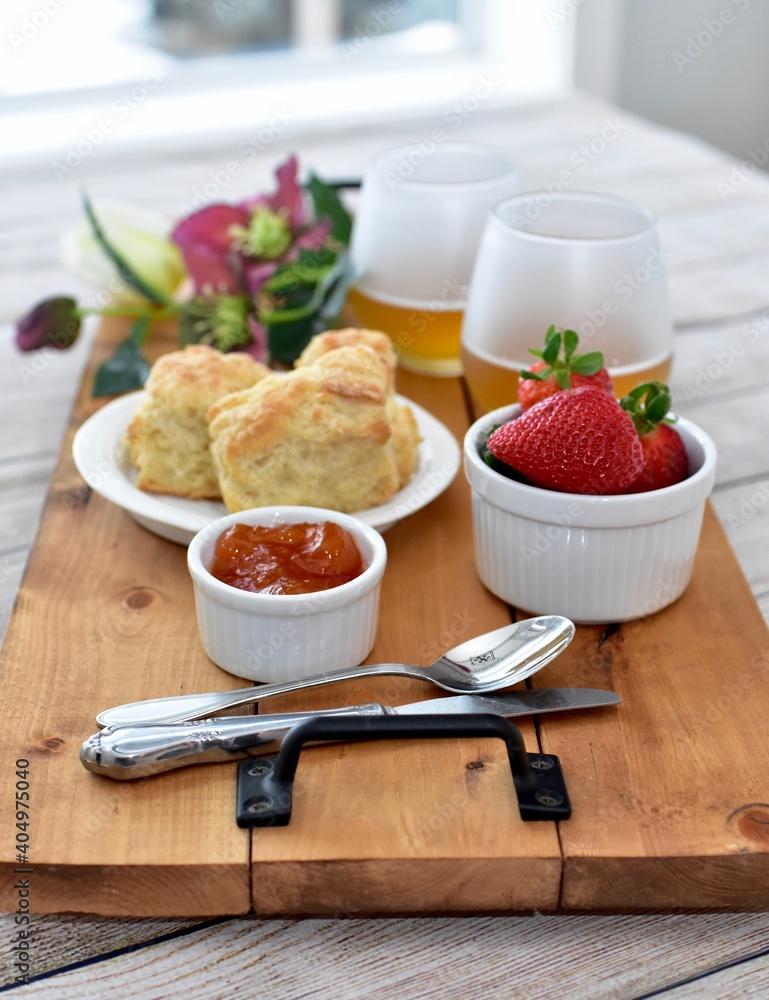 Celebratory Mother's Day brunch for breakfast in bed to honour Mom with gourmet scones and preserves and champagne. Celebratory Mother's Day brunch for breakfast in bed to honour Mom with gourmet scones and preserves and champagne.