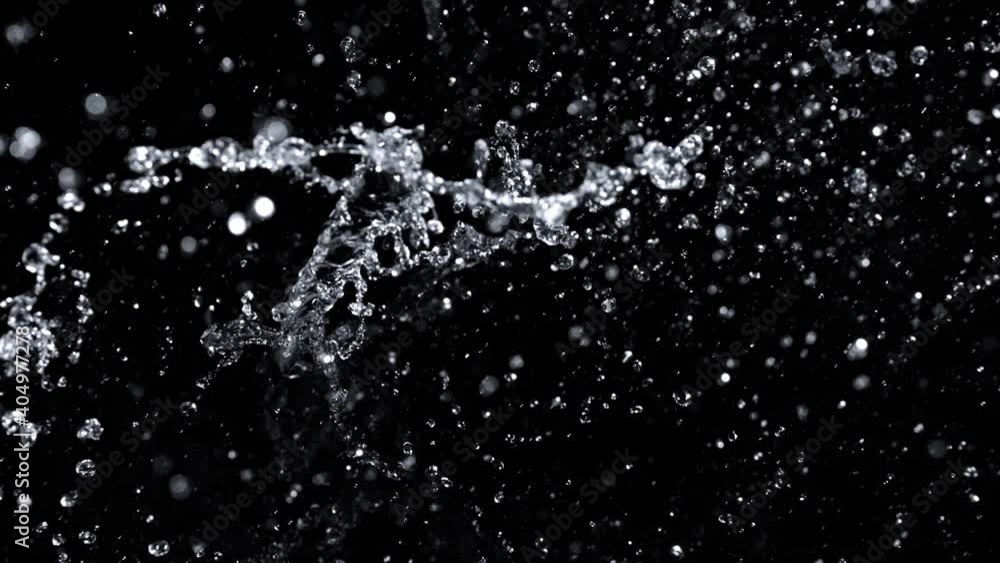 Super Slow Motion Shot of Abstract Water Splash Isolated on Black Background at 1000fps. Super Slow Motion Shot of Abstract Water Splash Isolated on Black Background at 1000fps.