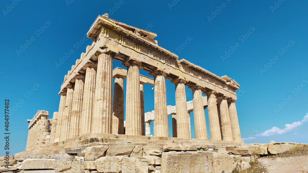 Parthenon temple on a bright day. Acropolis in Athens, Greece, panoramic banner image.