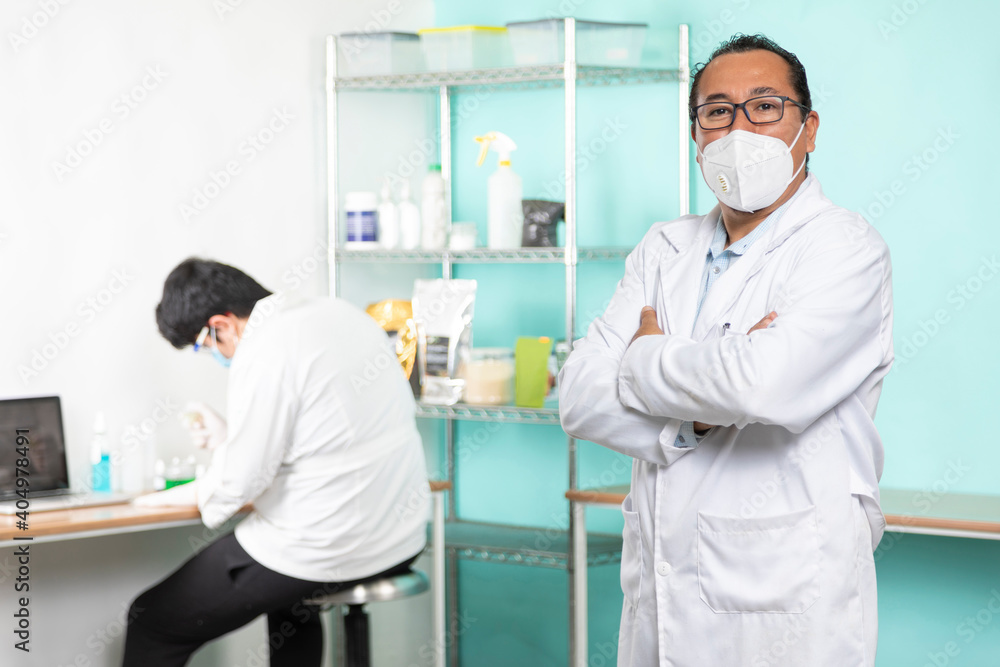 Proud enterprising man in his lab Proud enterprising man in his lab