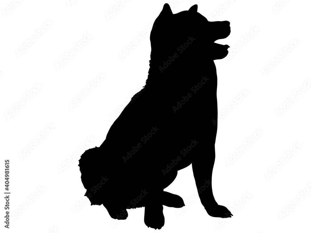 お座りをする犬のシルエット お座りをする犬のシルエット