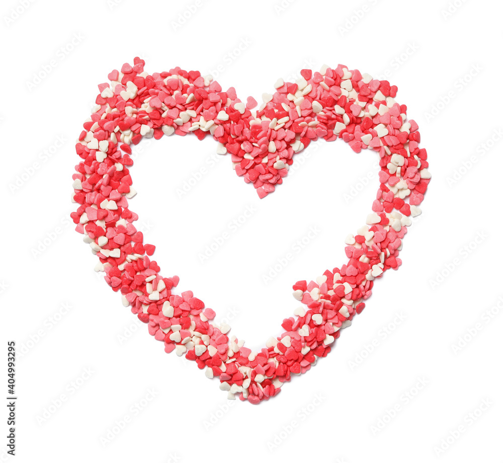 Heart made of sweet candies on white background, top view