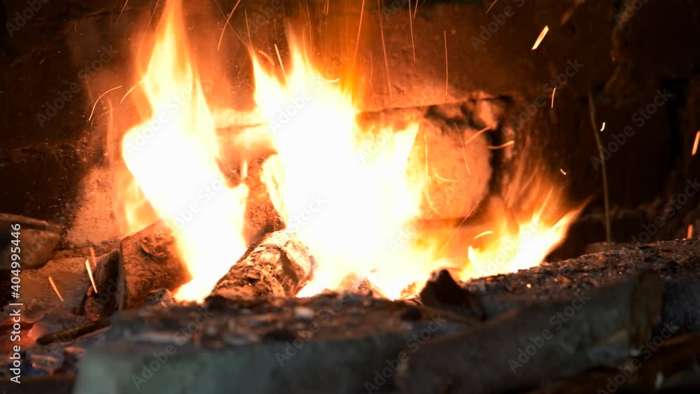 Fire in blacksmith workshop. Burning flame in a forge. Blacksmithing concept. Fire in blacksmith workshop. Burning flame in a forge. Blacksmithing concept.